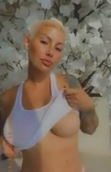 Amber Rose playing and showing her boobs
