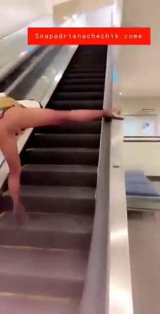 1048. Adriana squirts on the escalator