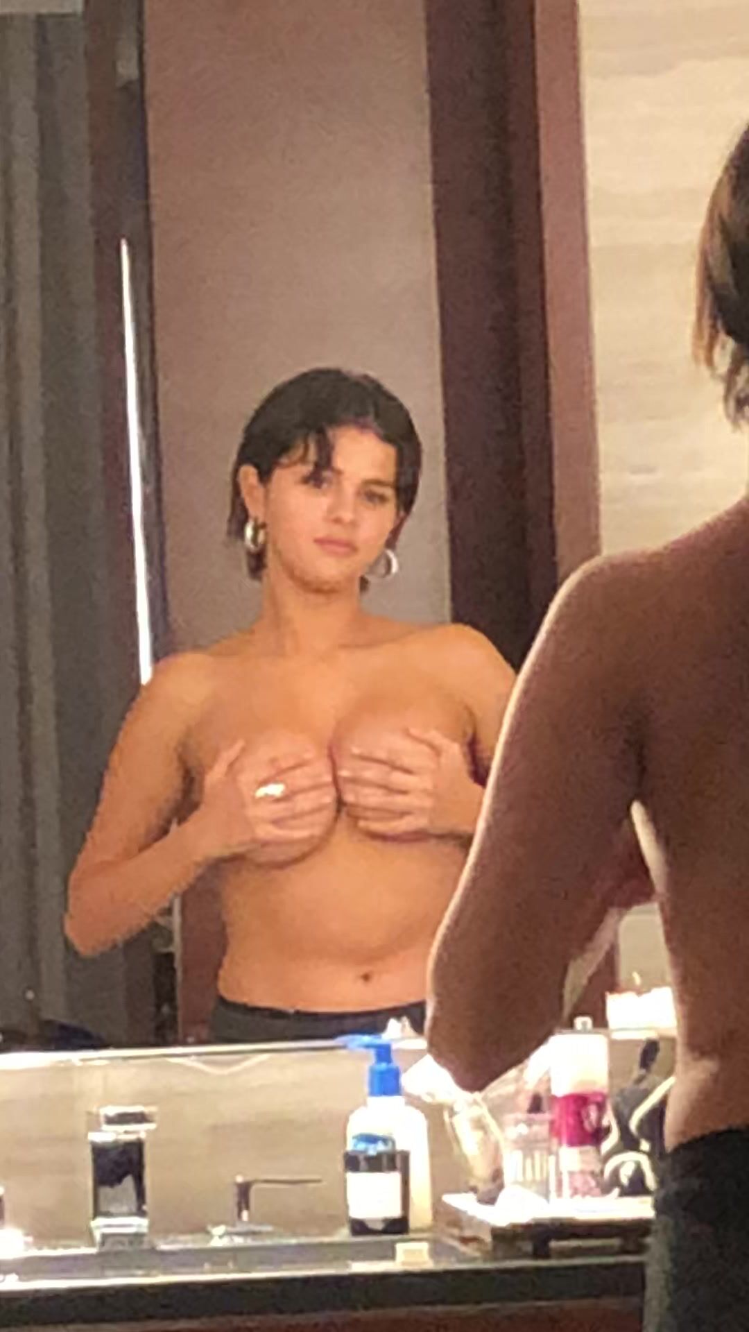 Selena Gomez boobs squeezing