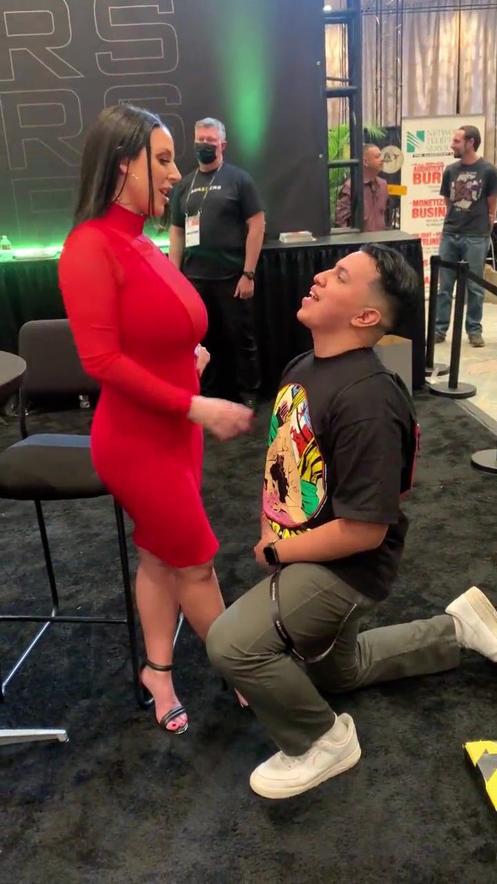 Angela White spitting in a fan's mouth